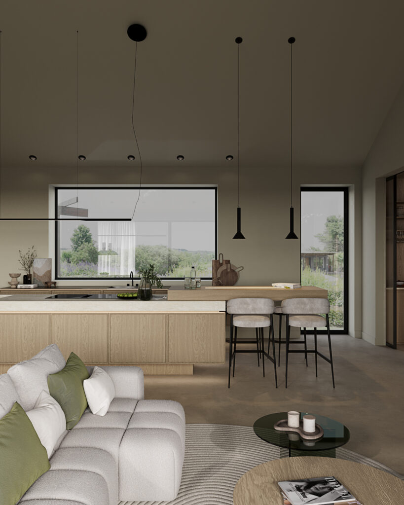 Stylish - Modern kitchen and living room with light wood cabinets, a gray sofa adorned with green cushions and stylish ceiling lights. Large windows offer views of the greenery.