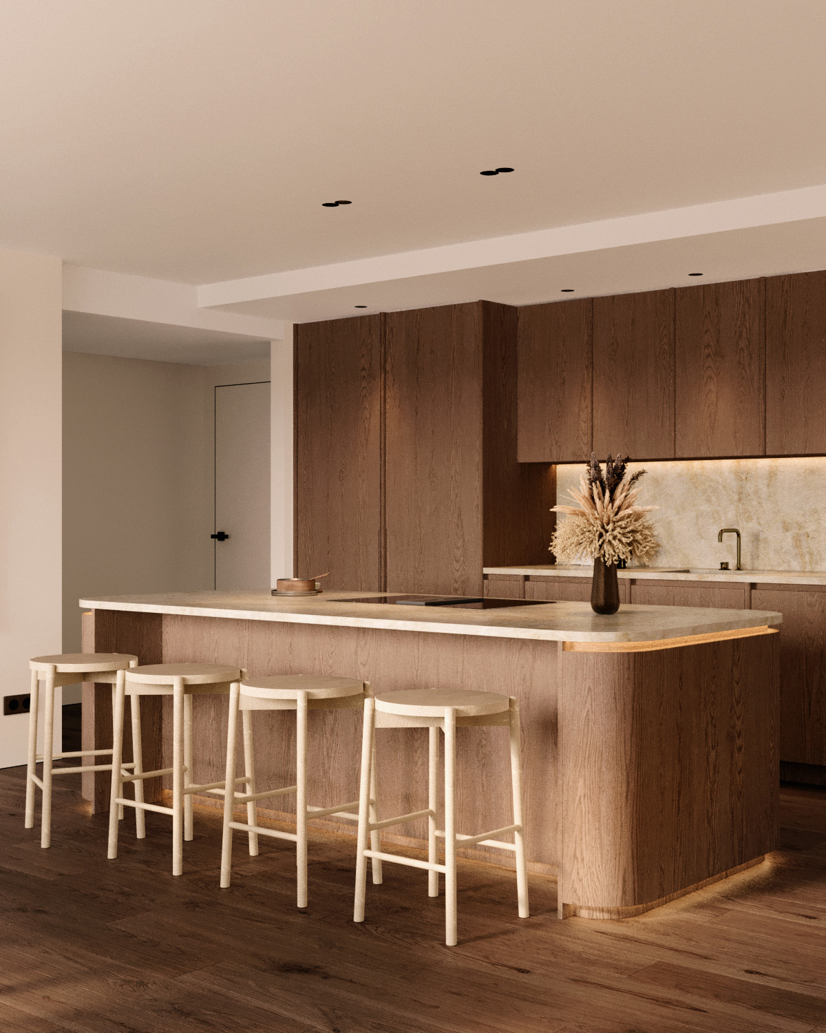 Stylish - Modern and stylish kitchen with wooden cabinets, a large island with beige countertop and four white stools. A vase of dried flowers elegantly adorns the island. The floor is beautiful dark wood.