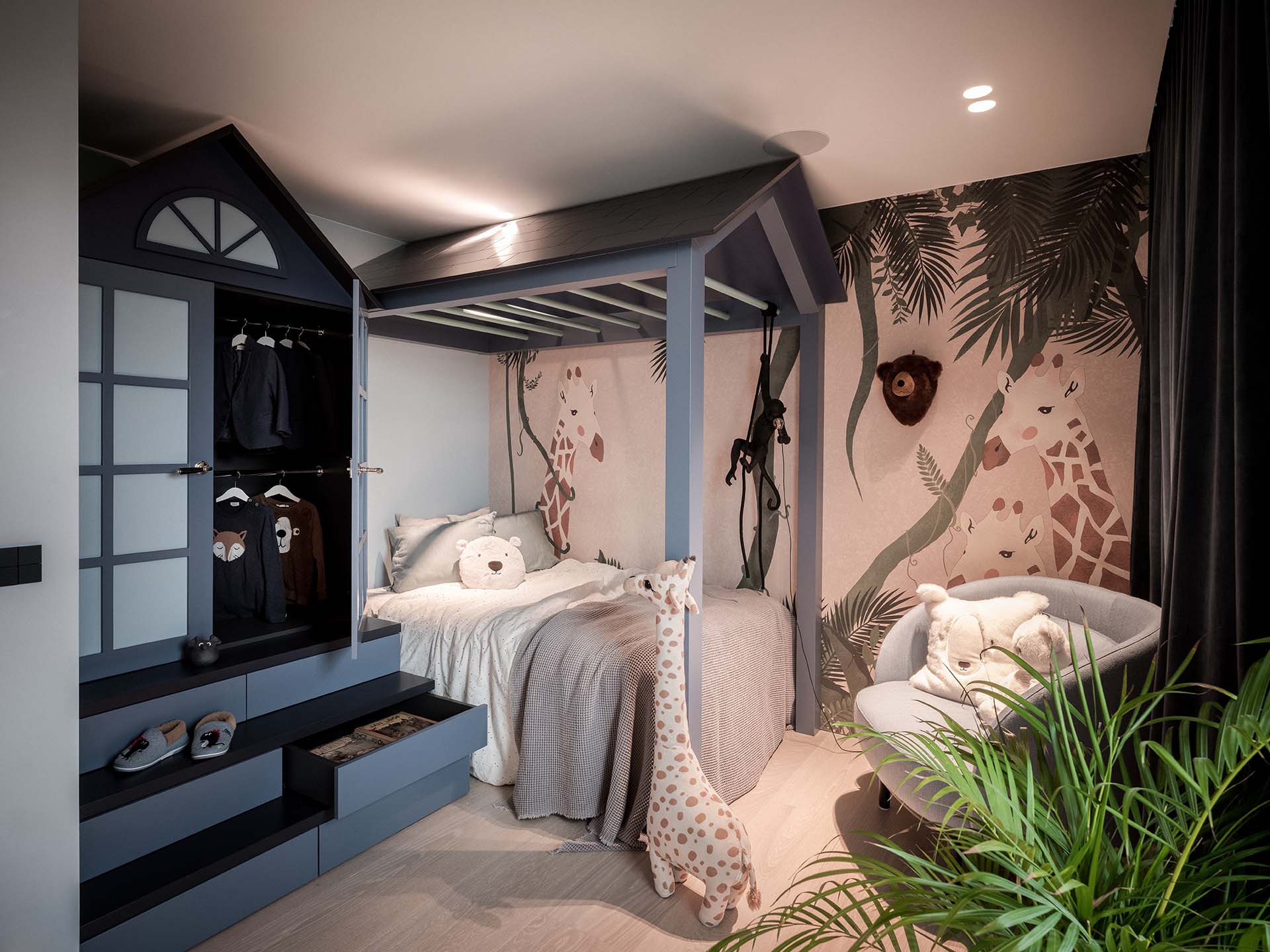Stylish - A child's bedroom features a stylish house-shaped bed frame, jungle rugs, plush toys and a charming giraffe decoration. A chair and potted plant add to the lovely atmosphere.