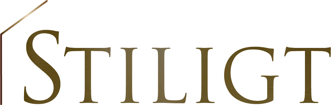Stiligt - Texten "STILIGT" i ett serif-teckensnitt med en subtil metallisk glans.